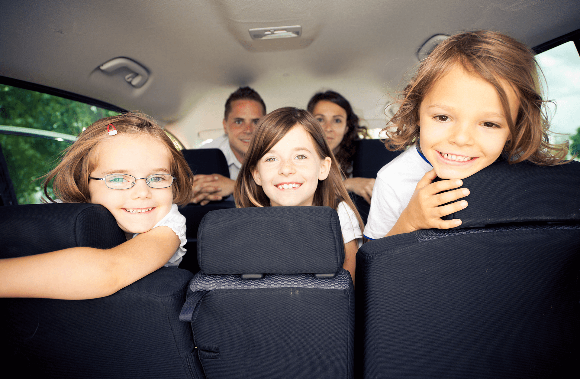 Family sitting in the Car