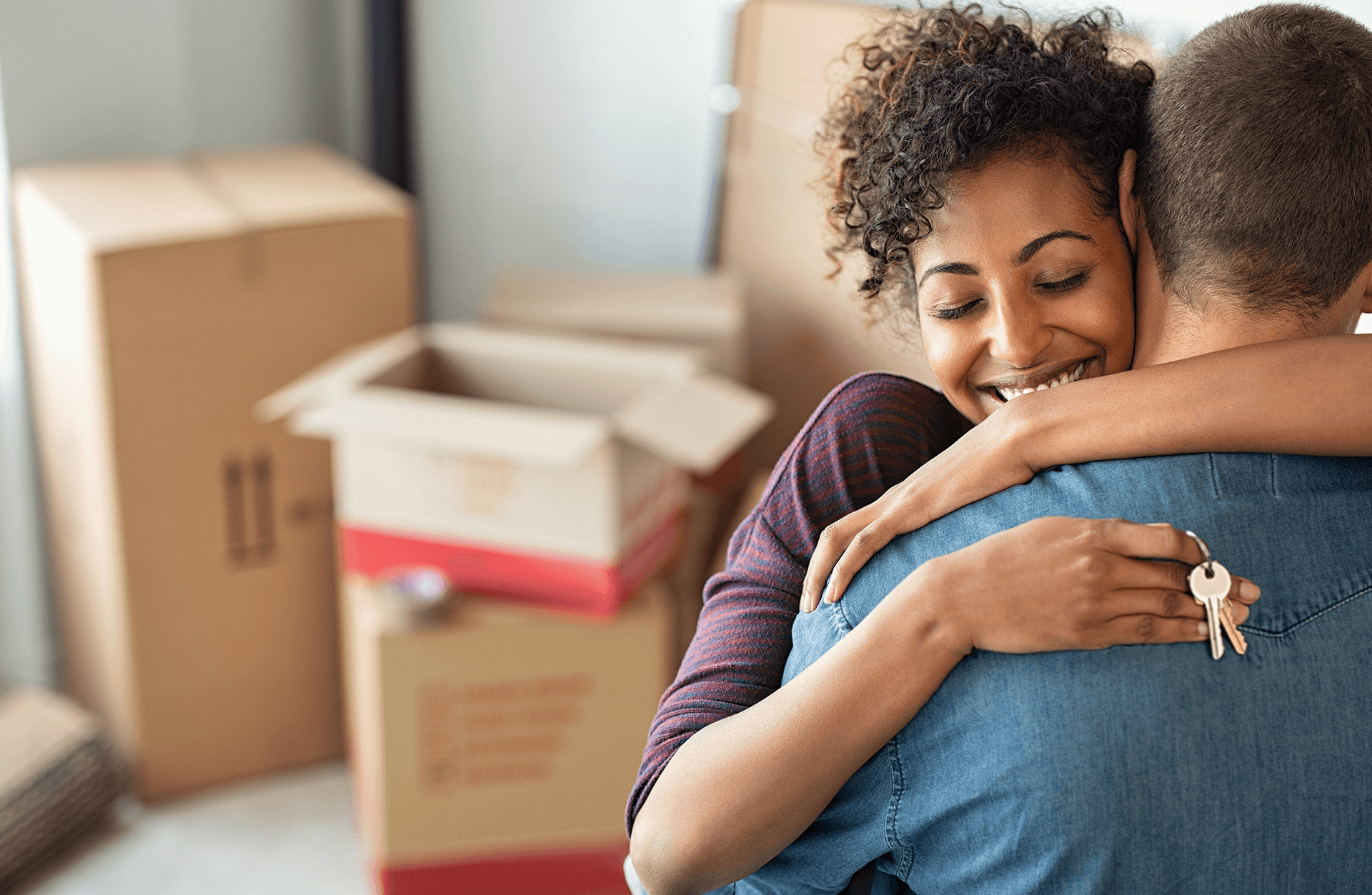 Woman holding home keys