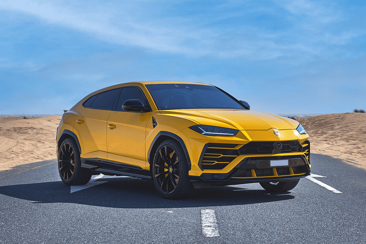 Yellow 2021 Lamborghini Urus on a road